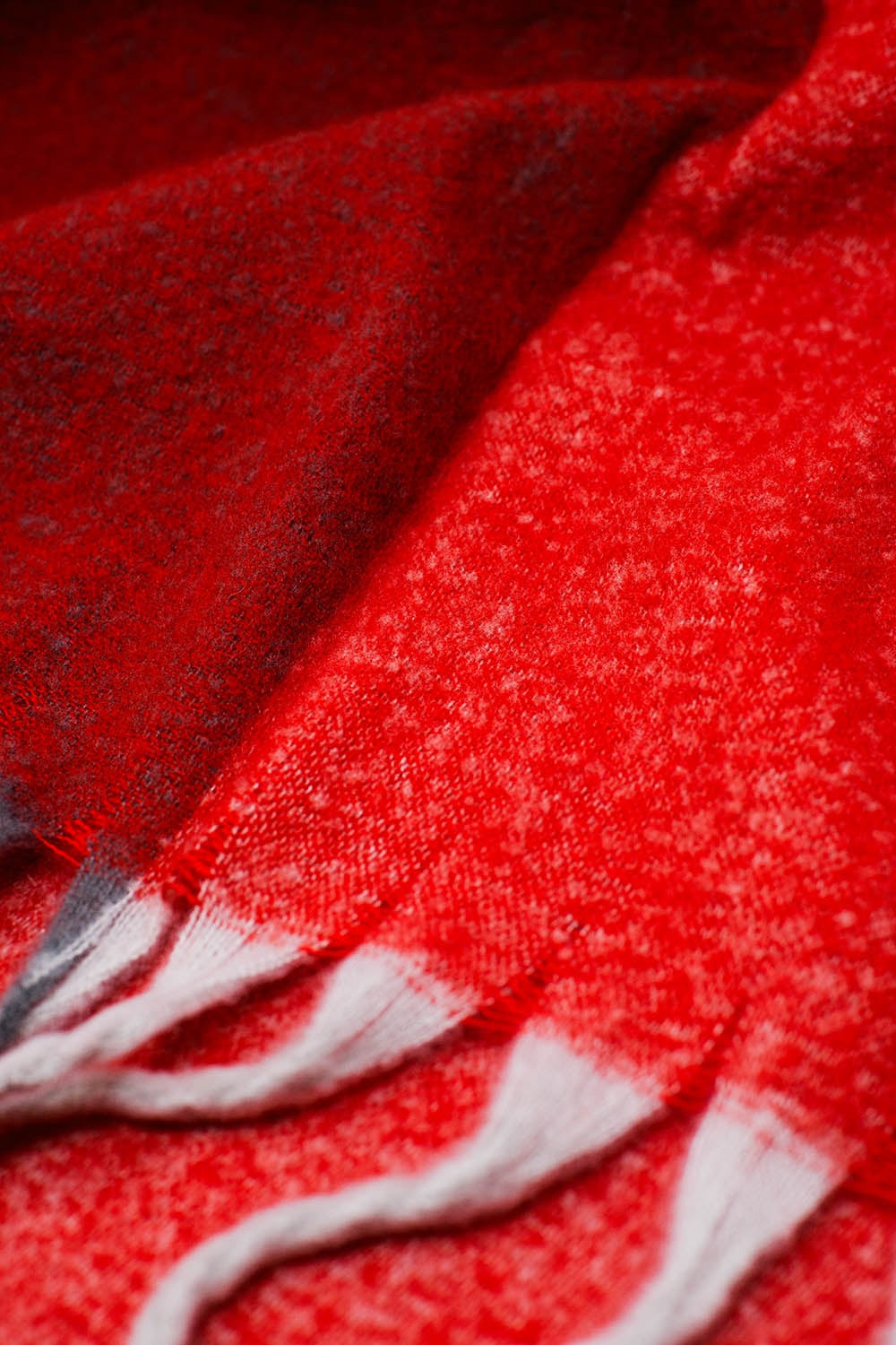 Chunky knit scarf in red color block with fringes