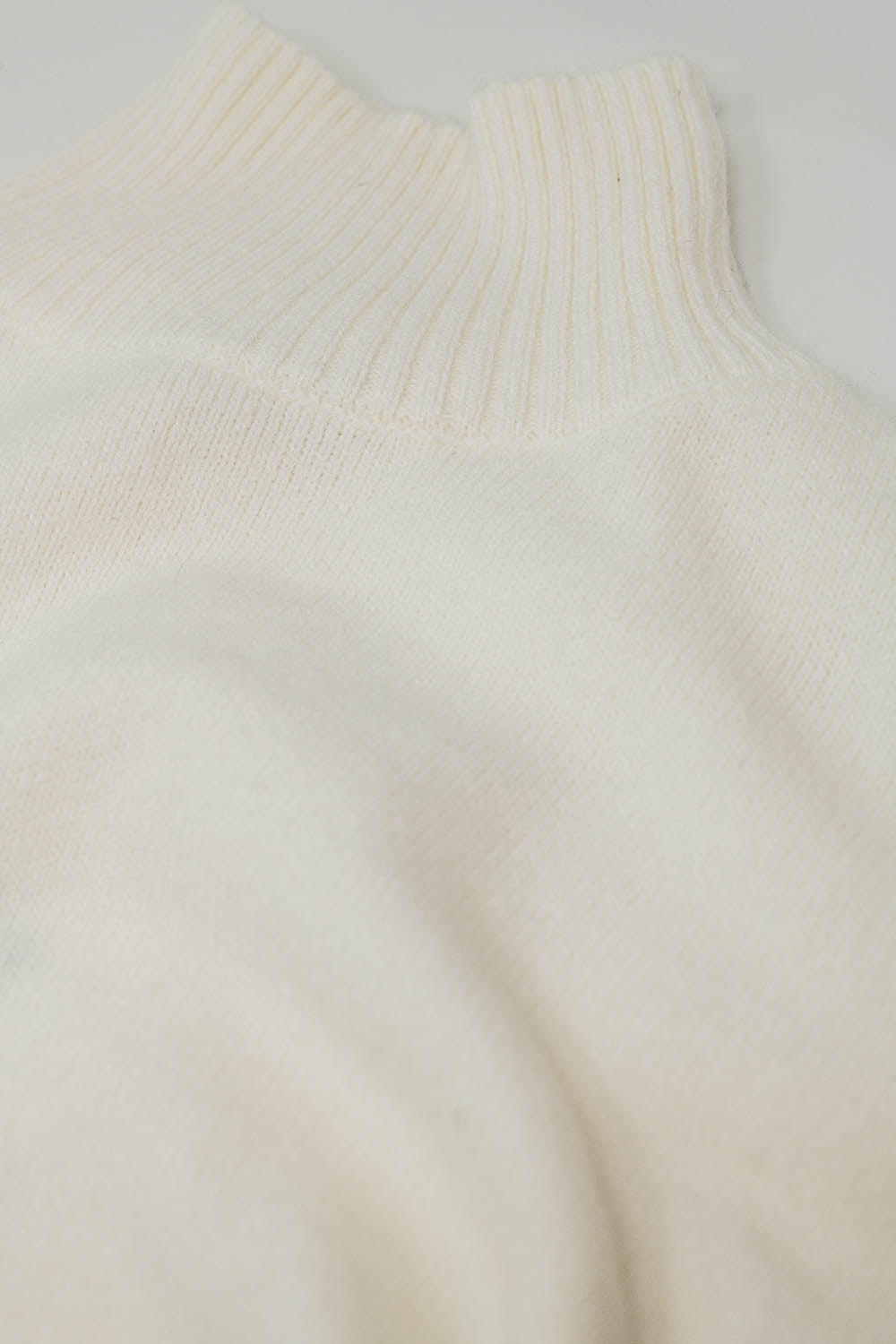 chunky knit sweater in ecru with turtleneck