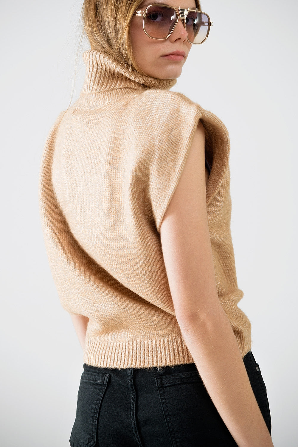 Cozy turtleneck sleeveless sweater in camel