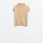 Cozy turtleneck sleeveless sweater in camel