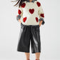 cozy white sweater with red hearts