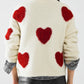 cozy white sweater with red hearts