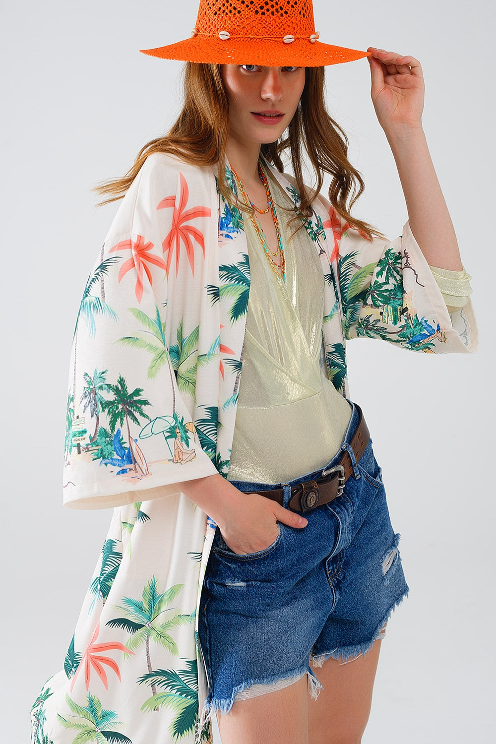 Kimono abierto color crema con estampado playero y largo midi