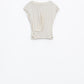 Cream short-sleeved top crossed at the bottom front