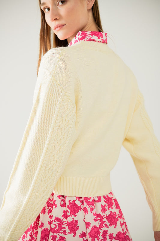 Cream soft knit sweater with cable pattern