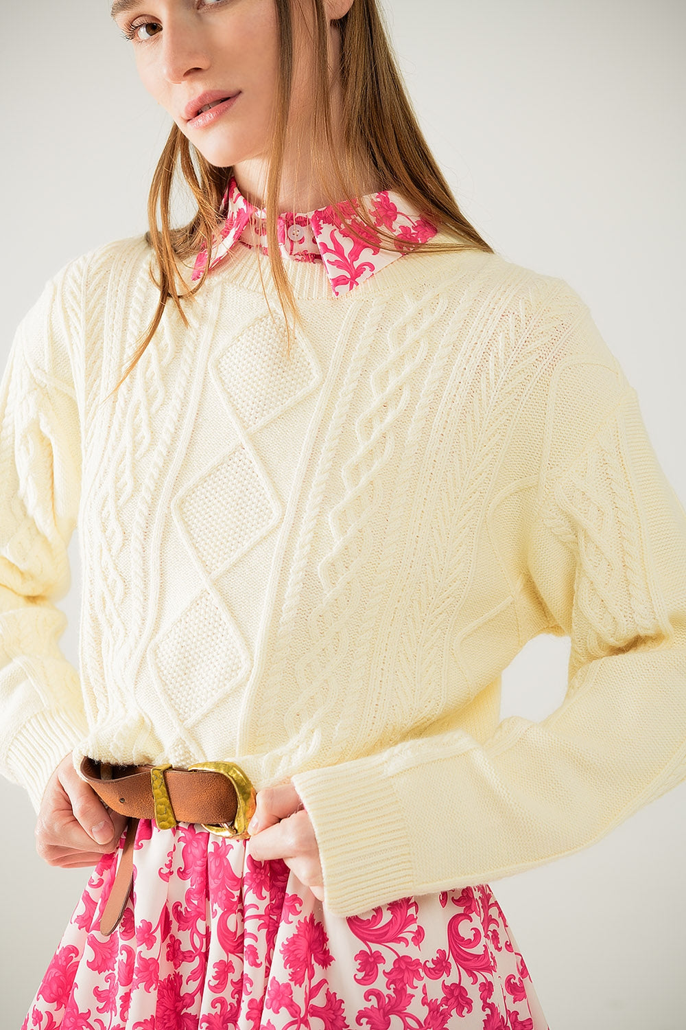 Cream soft knit sweater with cable pattern