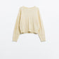 Cream soft knit sweater with cable pattern