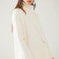 Cream soft knit turtleneck sweater with front slit