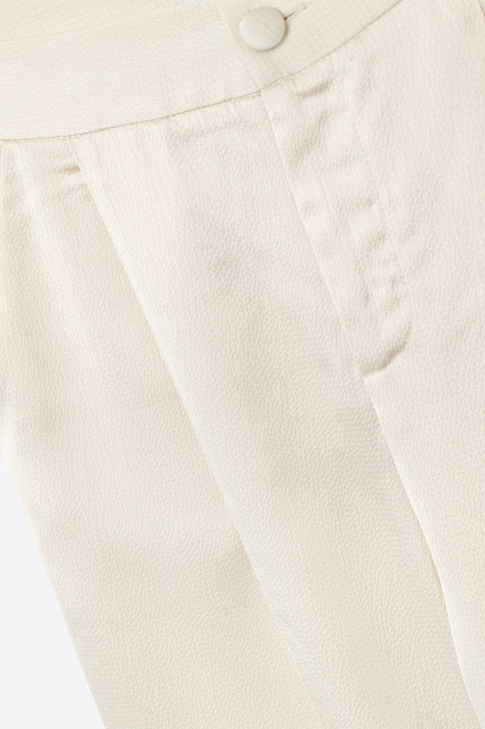 cream wide leg pants in textured satin