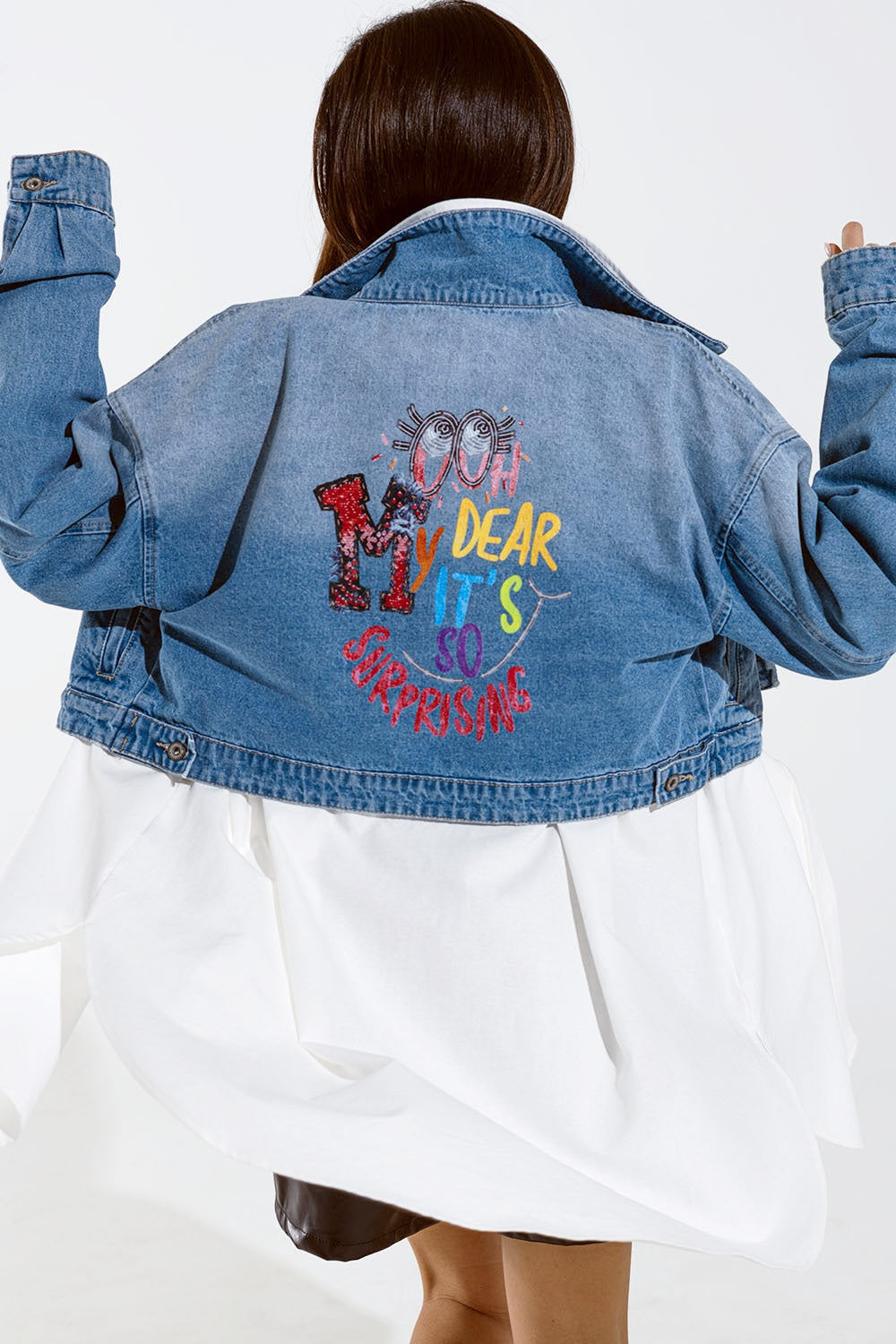 Q2 Cropped Denim Jacket with zipper closure and hand painted print at the  back