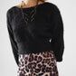 Q2 cropped fluffy sweater in black fitted at the waist