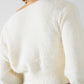 cropped fluffy sweater in cream fitted at the waist