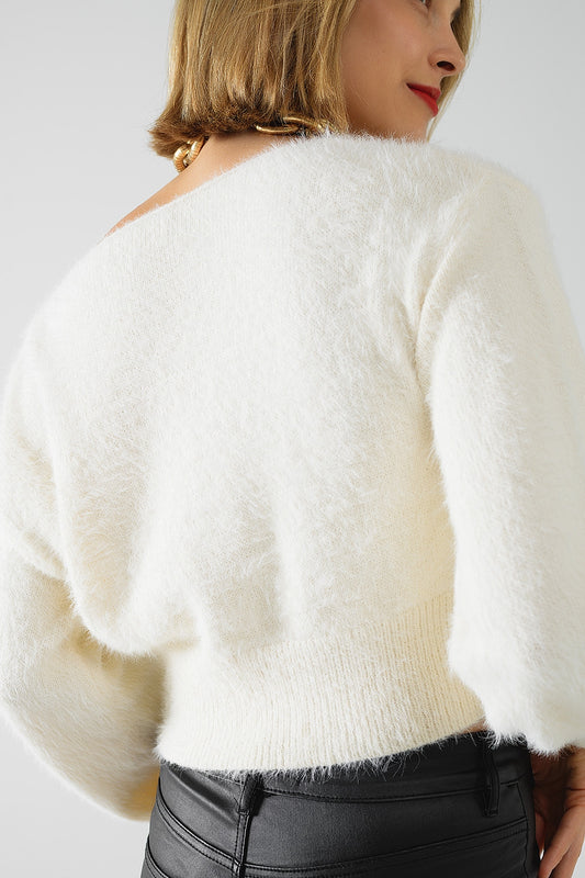 cropped fluffy sweater in cream fitted at the waist