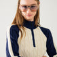 Q2 cropped white and navy sweater with neck zipper