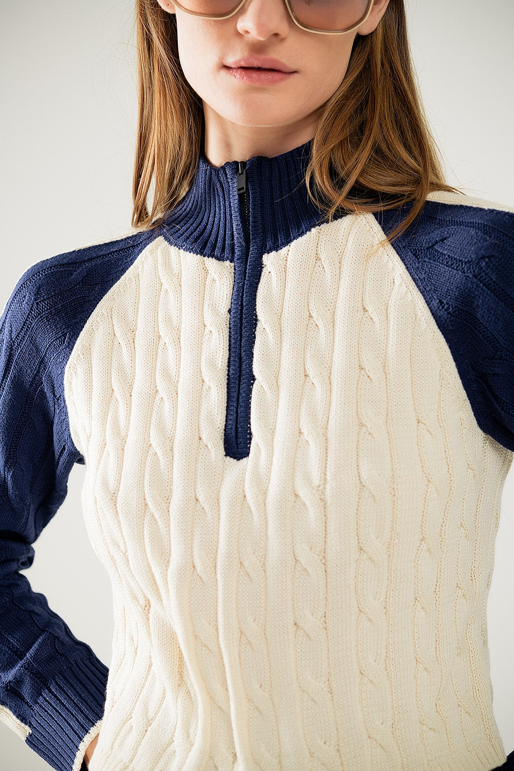 cropped white and navy sweater with neck zipper