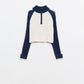 cropped white and navy sweater with neck zipper