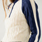 cropped white and navy sweater with neck zipper