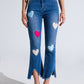 Q2 Dark Wash Skinny Jeans With Hearts Surrounded With Studds