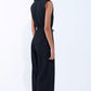 draped black jumpsuit in crinkled fabric