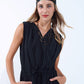 draped black jumpsuit in crinkled fabric