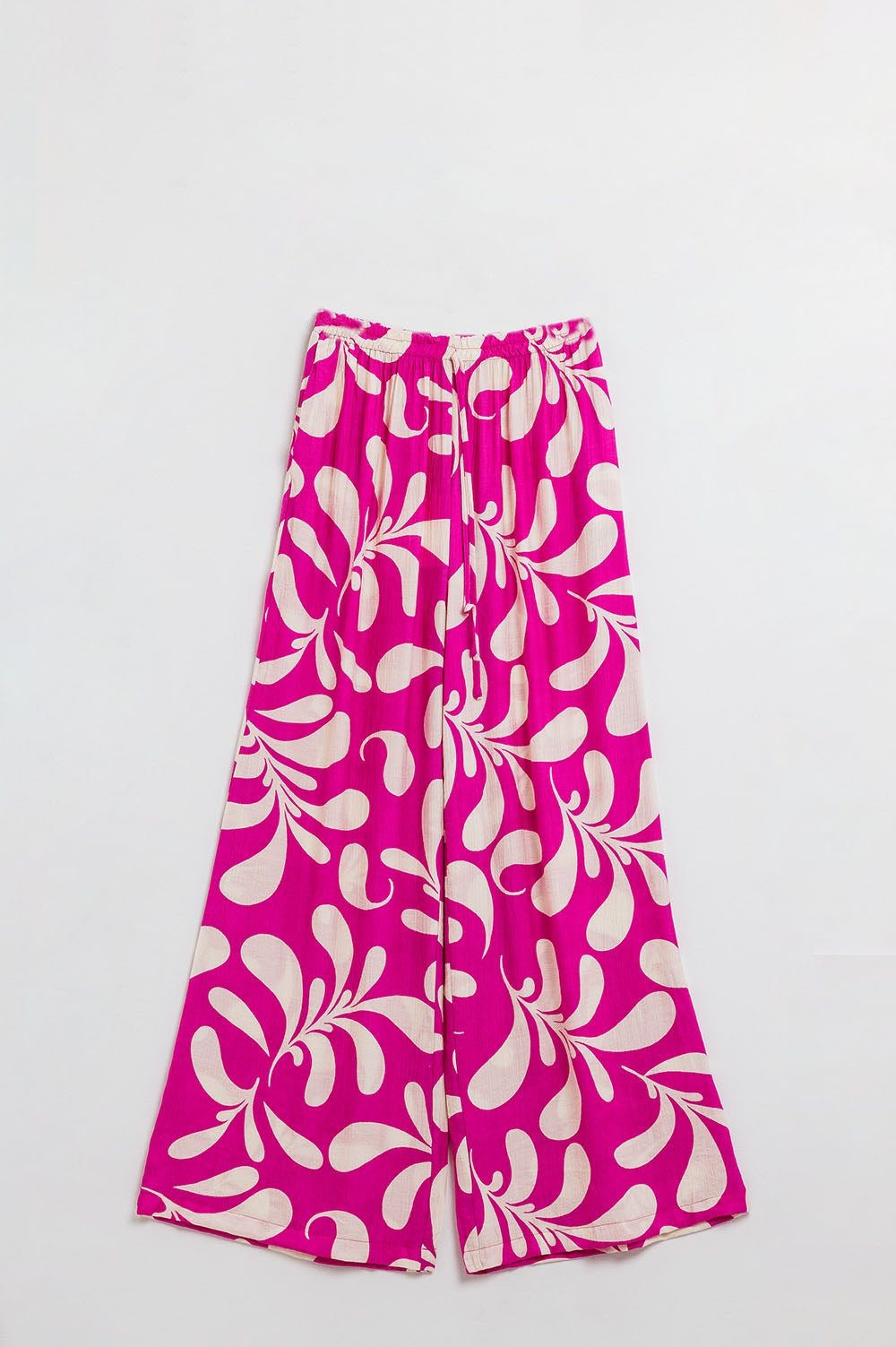 Pantalones rectos con cintura elástica y estampado floral fucsia