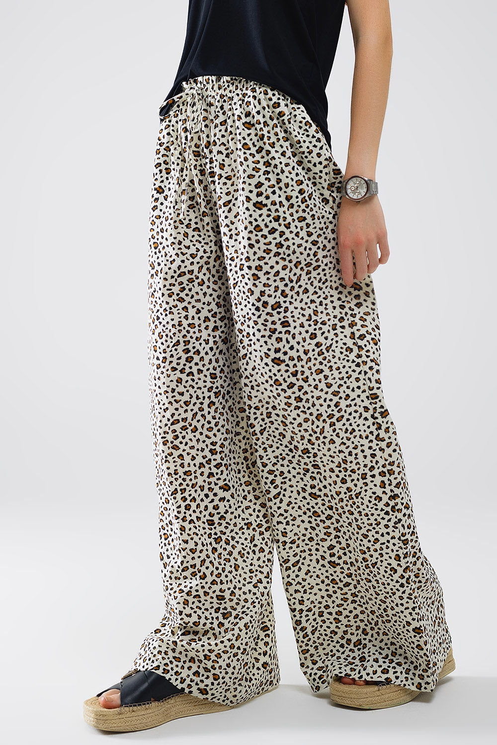 Pantalones rectos con cintura elástica y estampado de leopardo