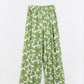 Pantalones anchos con cintura elástica y estampado floral verde