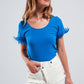 Q2 Embellished top with faux feather cuffs in blue