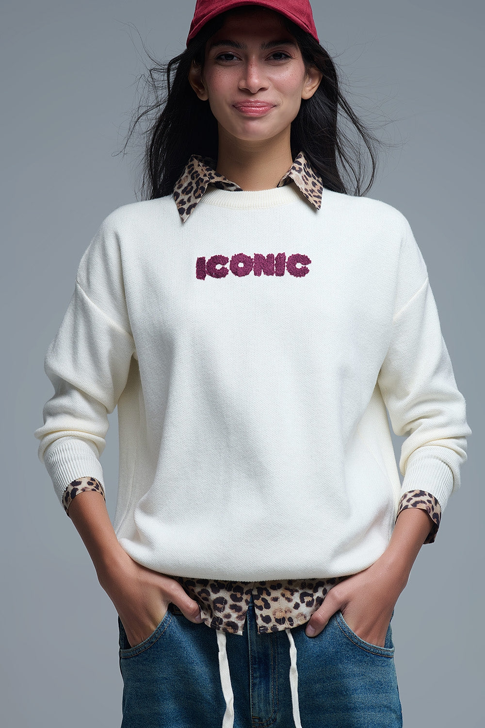 Q2 Embroidered ICONIC Sweater with Global Tour Back Print in Cream