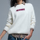 Embroidered ICONIC Sweater with Global Tour Back Print in Cream