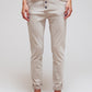 Q2 Exposed buttons skinny jeans in beige