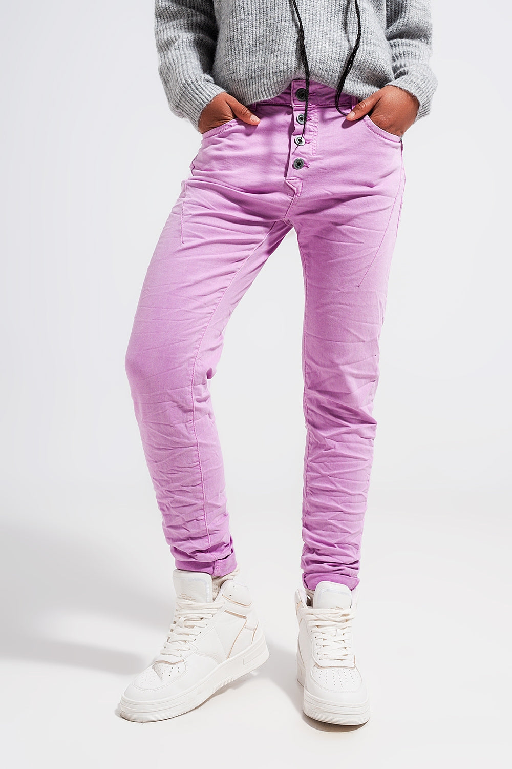 Exposed buttons skinny jeans in pink