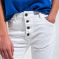 Exposed buttons skinny jeans in white