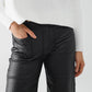 Faux leather pants with wide leg and pocket detail