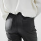 Faux leather pants with wide leg and pocket detail