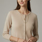fine knit beige cardigan with rhinestone detail
