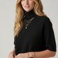 Fine knit sweater in black with a high neck and elbow-length sleeves