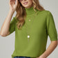 Fine knit sweater in olive green with a high neck and elbow-length sleeves