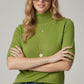 Fine knit sweater in olive green with a high neck and elbow-length sleeves