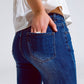 Flared Skinny Jeans With Raw Hem Edge In Mid Wash