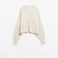 Q2 Fluffy beige sweater with high neck and balloon sleeves