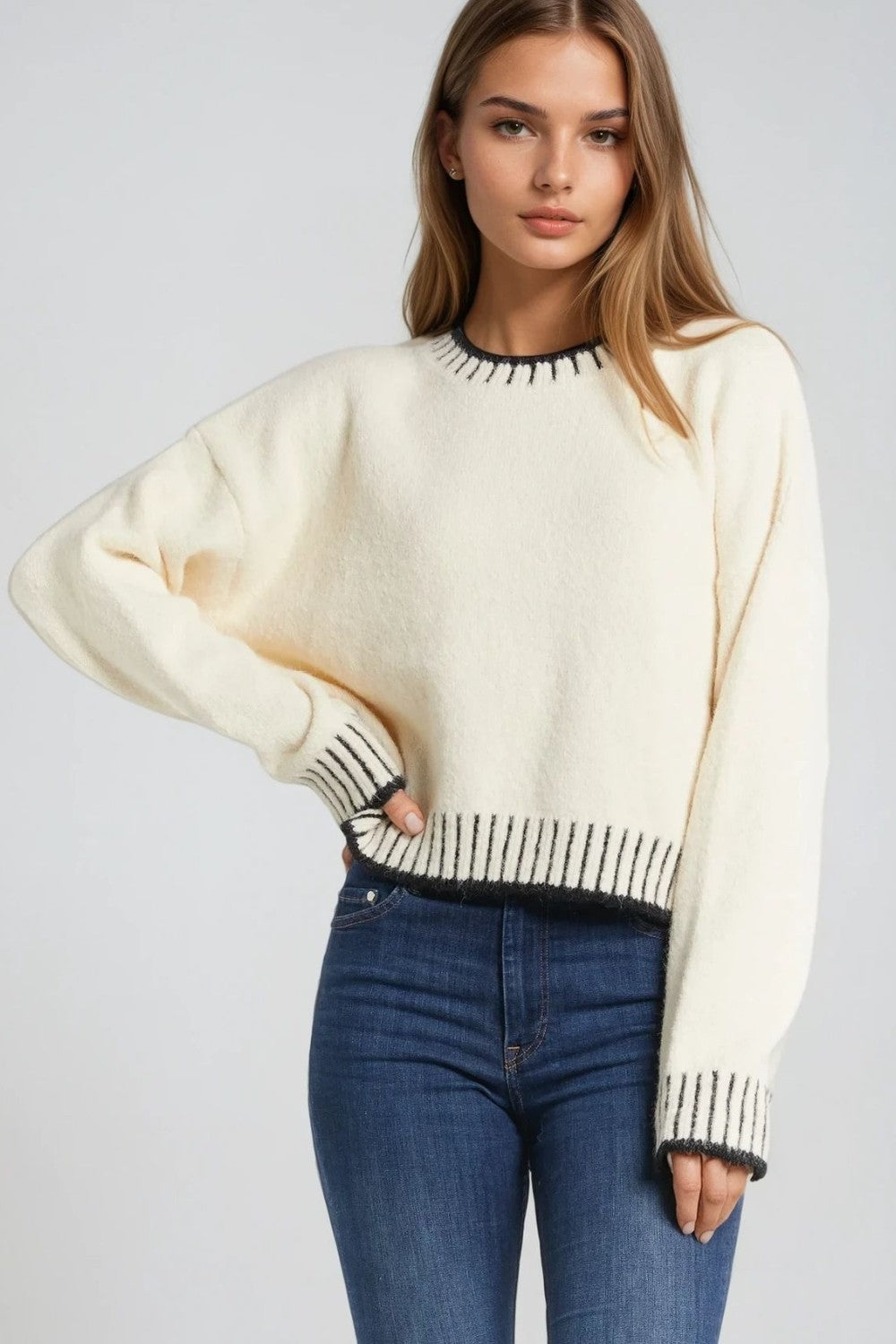 Q2 Fluffy cream sweater with ribbed detail at neck and hem