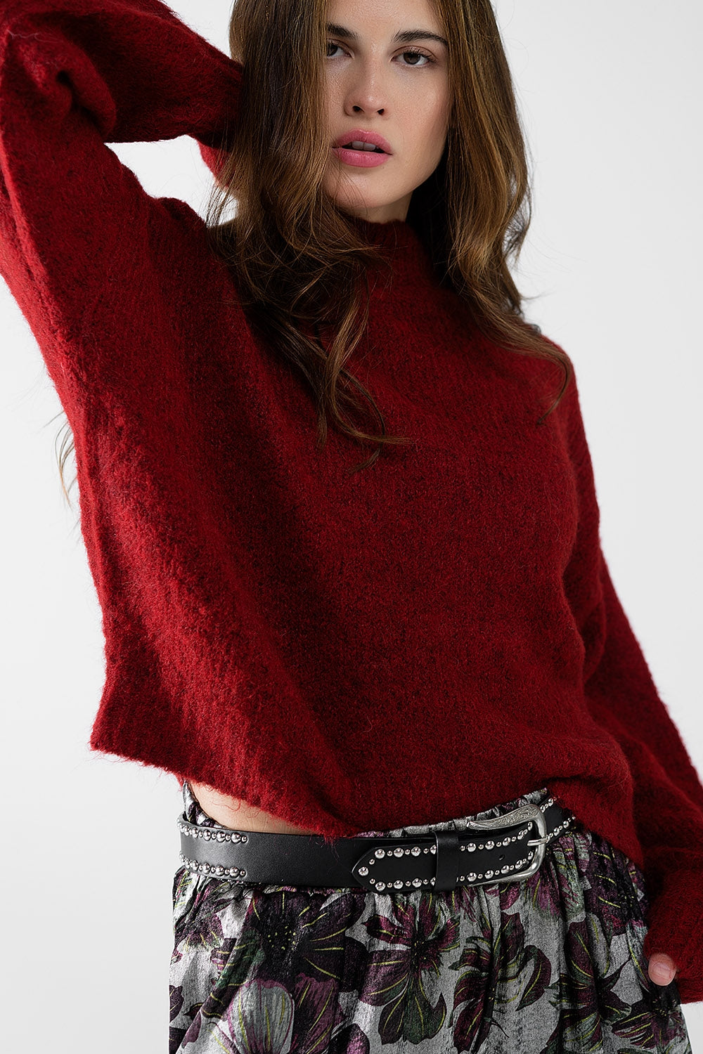 Fluffy red sweater with high neck and balloon sleeves