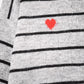 gray striped knit sweater with red heart detail