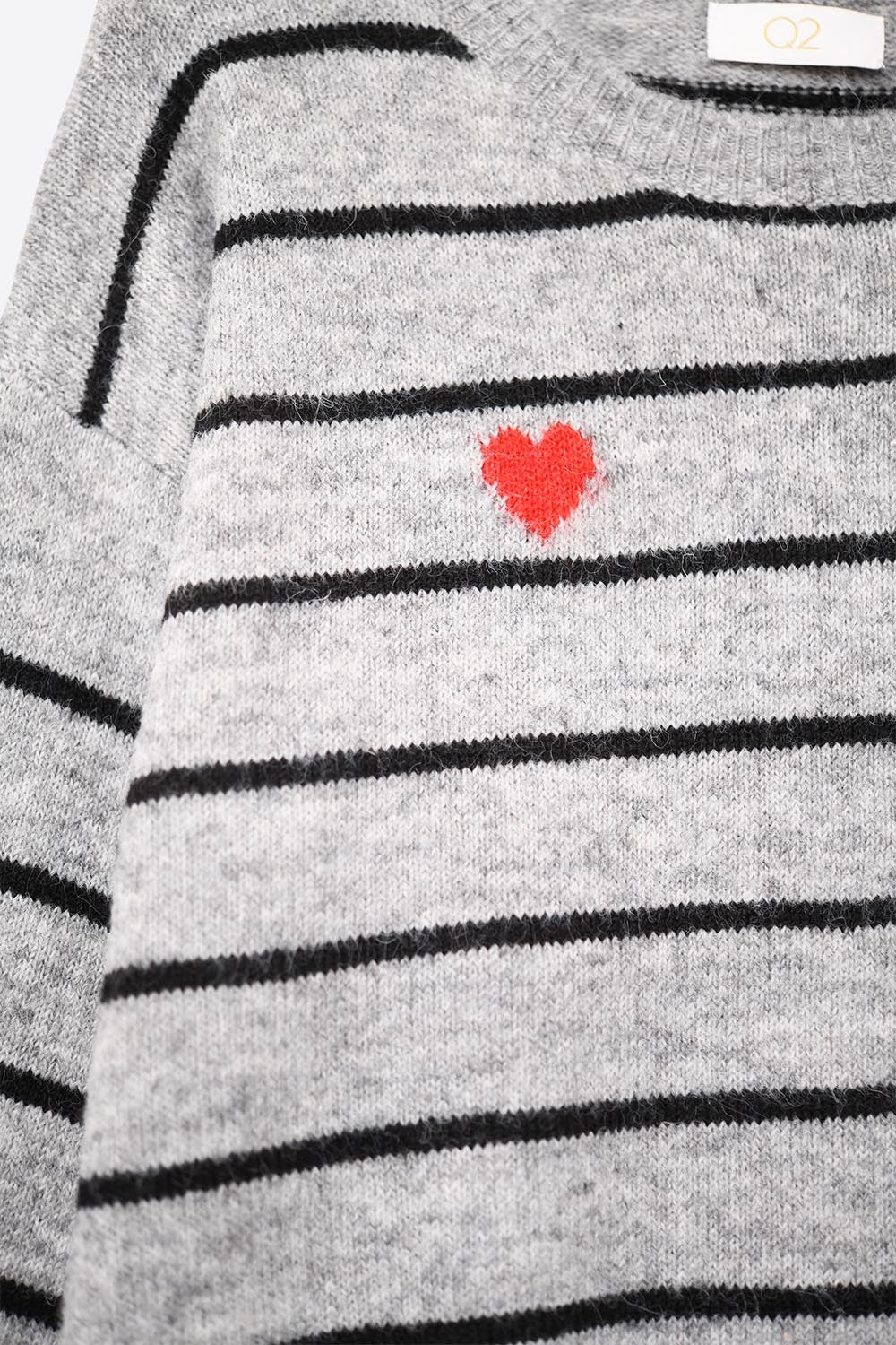gray striped knit sweater with red heart detail