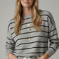 gray striped knit sweater with red heart detail