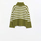 Q2 Green oversized trutleneck sweater with white stripes and splits on the side