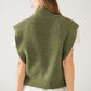 Green sleeveless turtleneck sweater with zipper closure