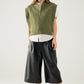 Green sleeveless turtleneck sweater with zipper closure