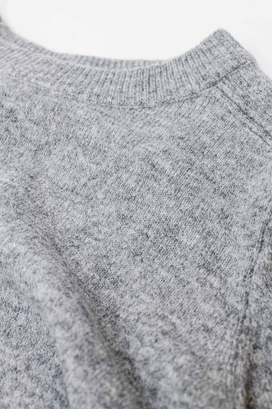 Grey crew neck sweater with seam detail on sleeve